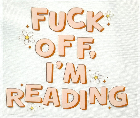 Text 'FUCK OFF, I'M READING' with decorative elements on a light background