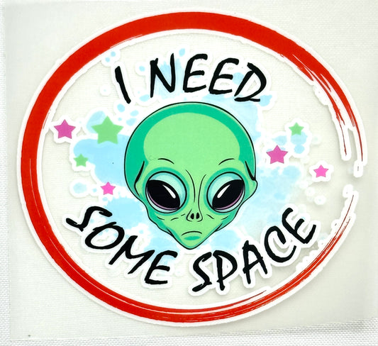 Sticker with an alien head and text 'I NEED SOME SPACE' on a white background