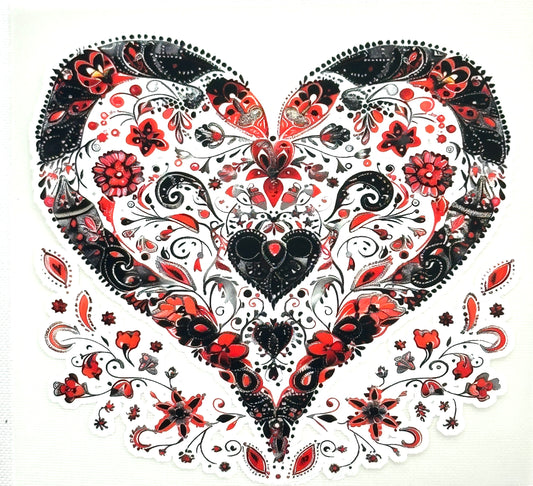 Decorative heart design with black, red, and white patterns on a white background