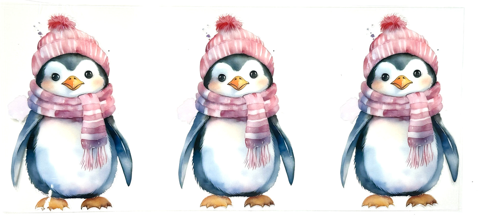Three penguins wearing pink scarves and hats on a white background