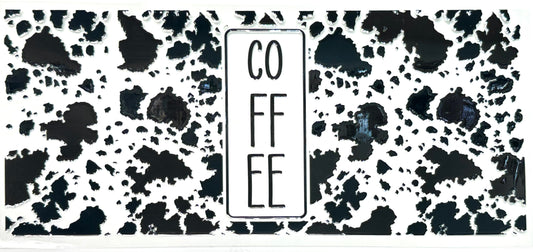 Black and white patterned mat with 'COFFEE' text