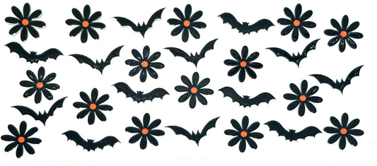 Halloween-themed decorations including black bats and flowers with orange centers on a white background.