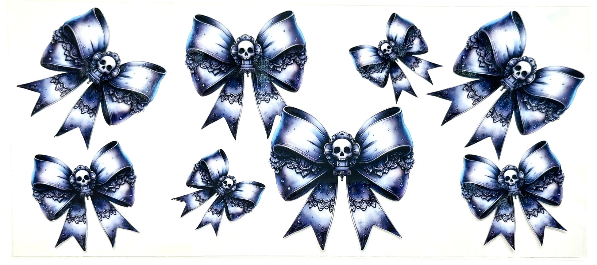 Set of decorative bows with skull designs on a white background