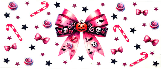 Halloween-themed decorative elements with a pink bow, candy canes, and stars on a white background.