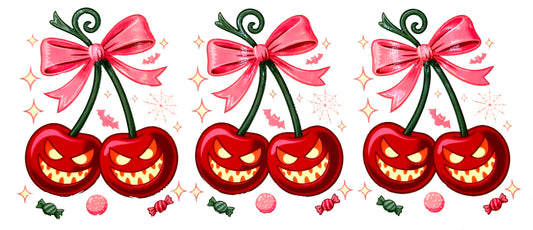 Three red cherries with glowing eyes and pink bows on a white background.