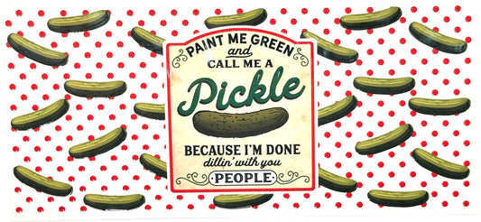 Cartoon pickle with humorous text on a polka dot background