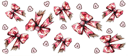 Pattern of pink and red bows with hearts on a white background