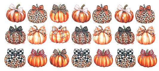 Pattern of pumpkins with bows on a white background