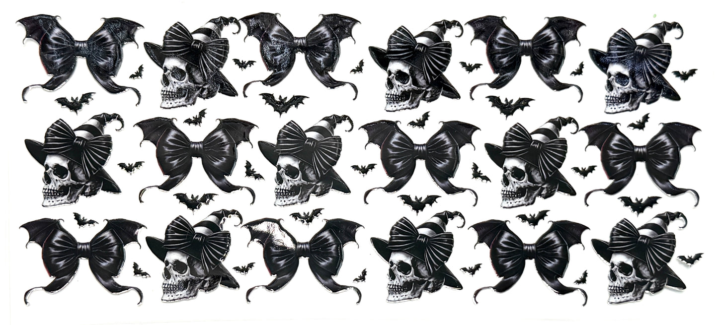 Pattern of black bows with skull designs on a white background