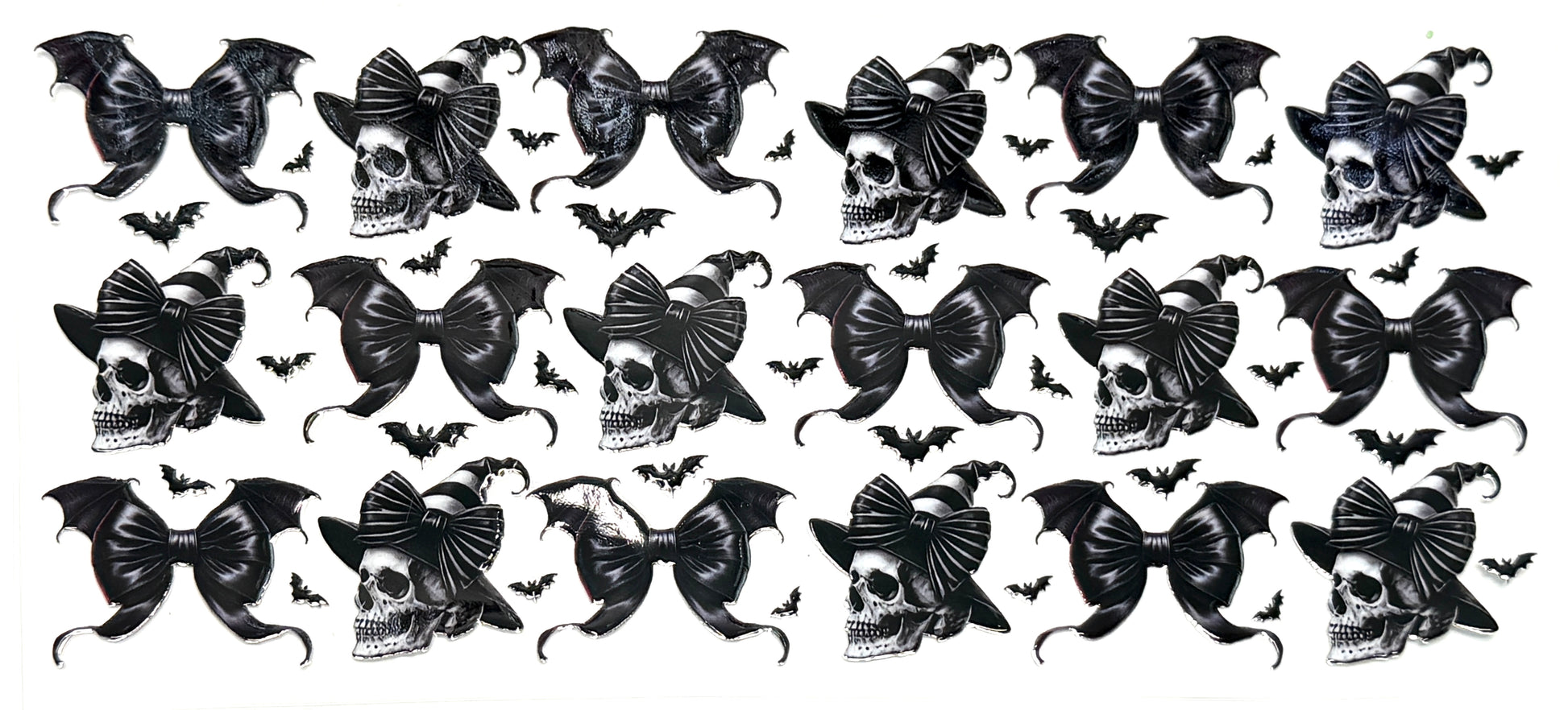 Pattern of black bows with skull designs on a white background
