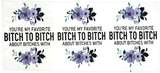 Four identical signs with floral designs and text on a white background