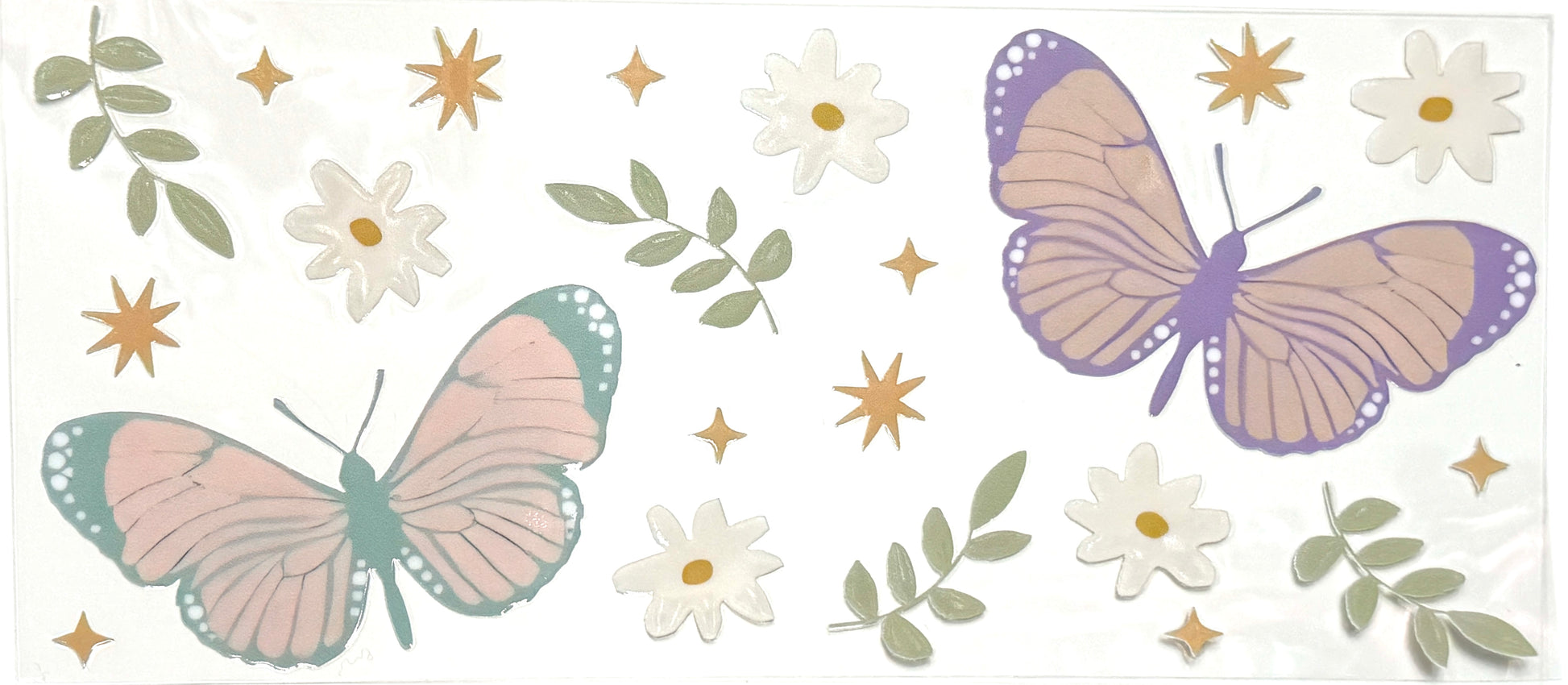 Butterflies, flowers, and leaves on a white background