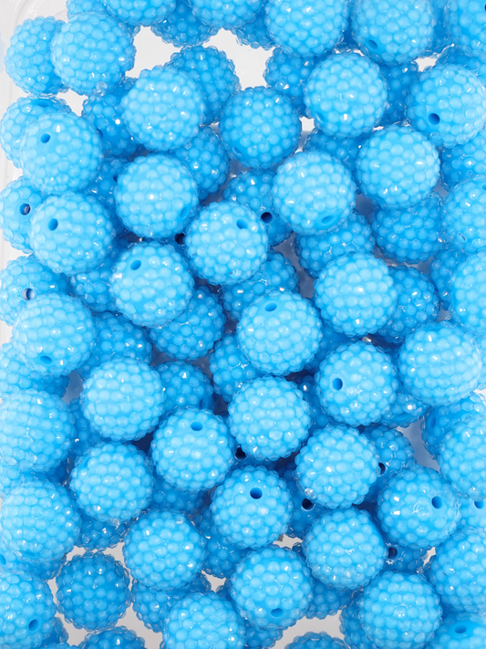 Collection of Caribbean blue colored jelly rhinestone textured beads