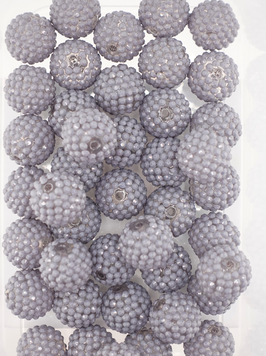 Collection of grey colored jelly rhinestone textured beads
