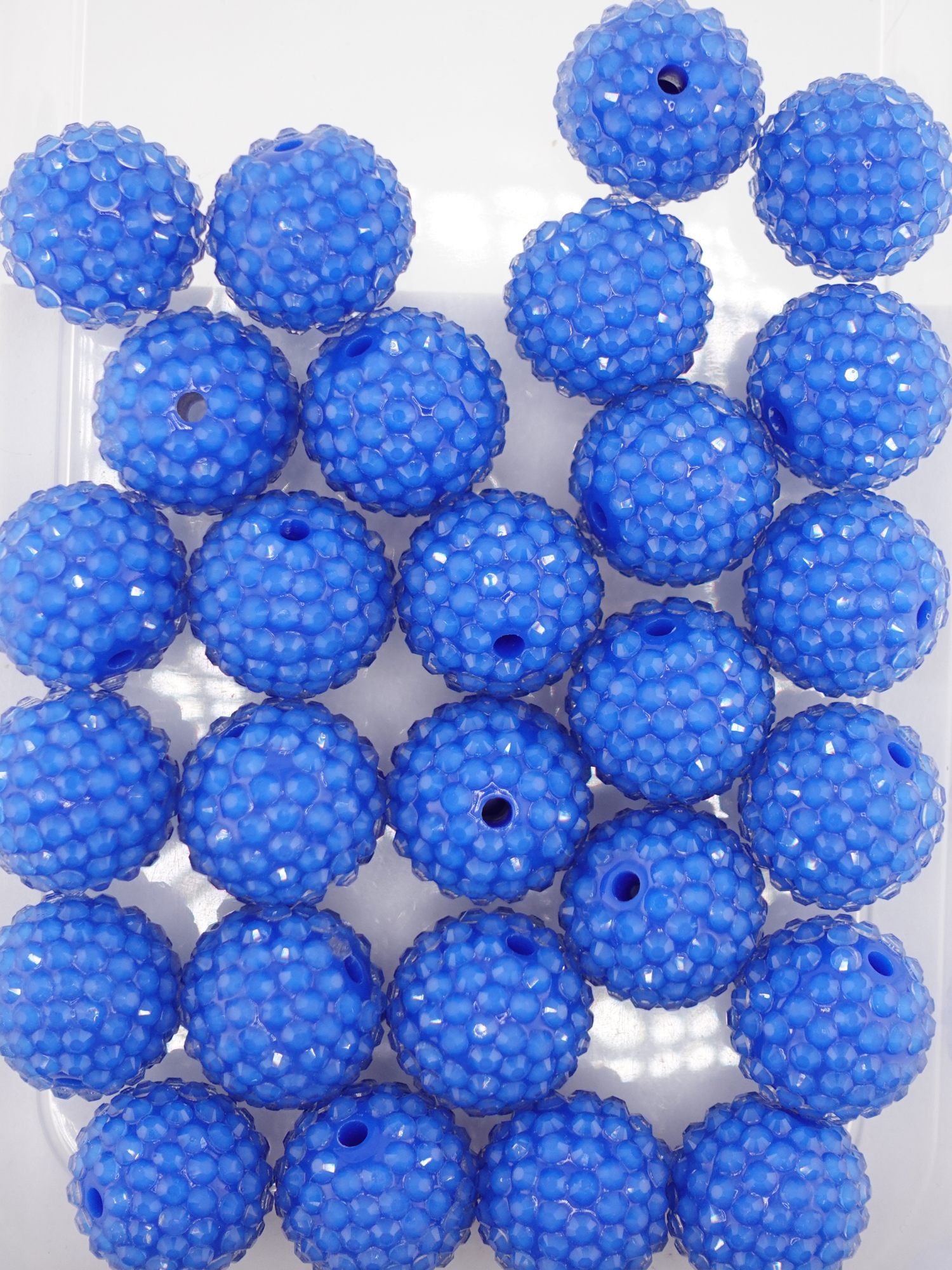 Collection of royal blue colored jelly rhinestone textured beads