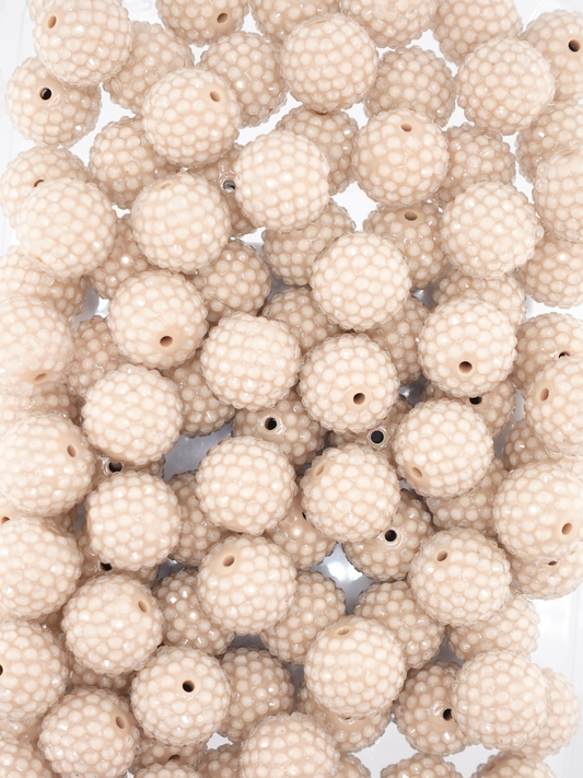 Collection of tan colored jelly rhinestone textured beads