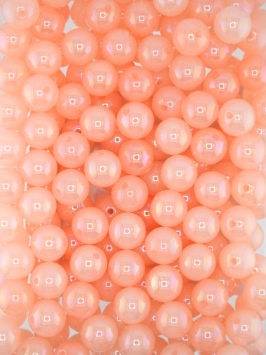 Collection of opalescent beads with a peach color
