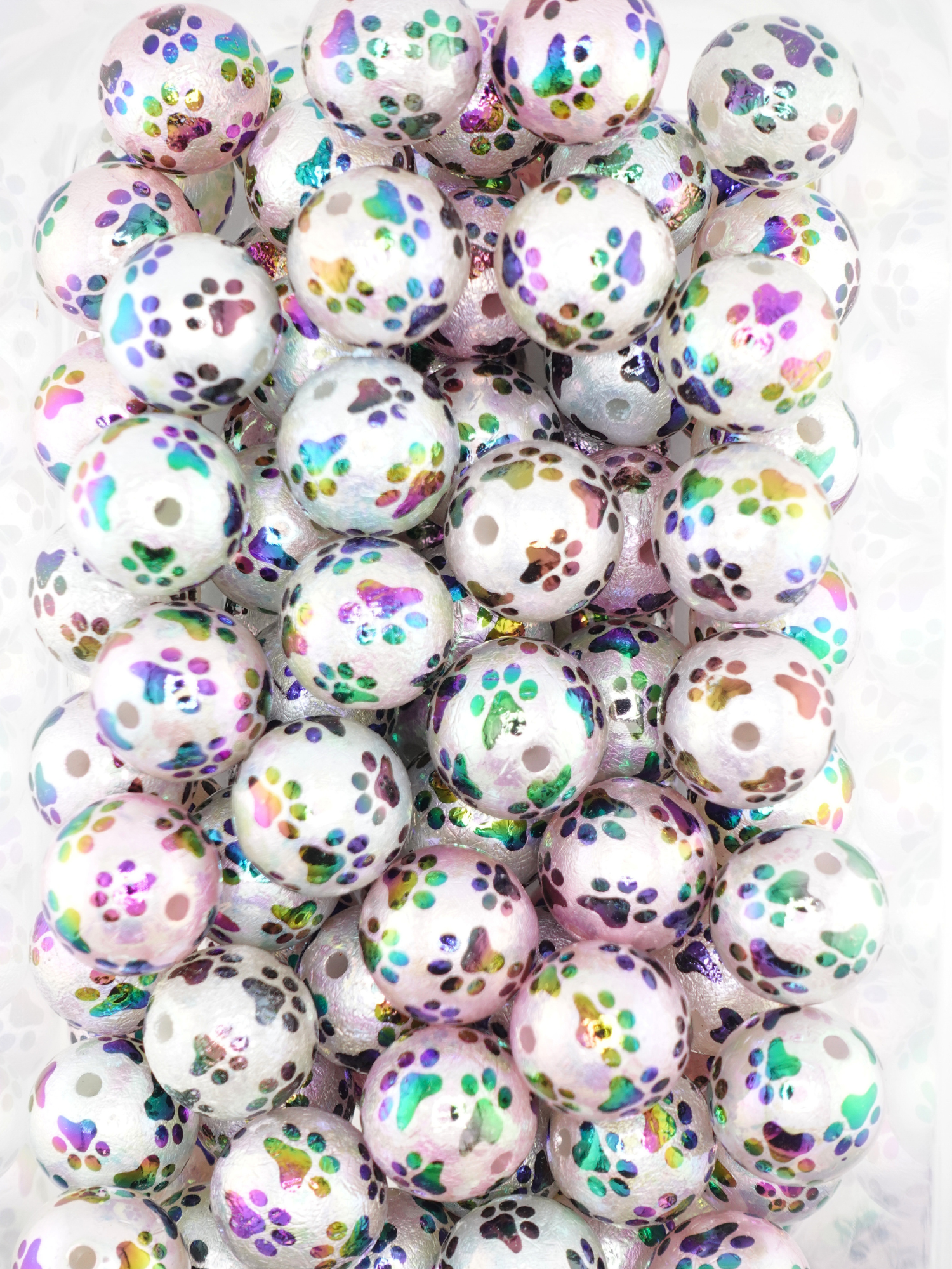 Collection of 20mm iridescent beads with a paw print design
