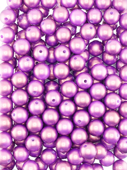Collection of plum colored beads with a pearl shimmer finish