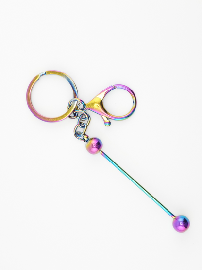 A single rainbow colored beadable keychain