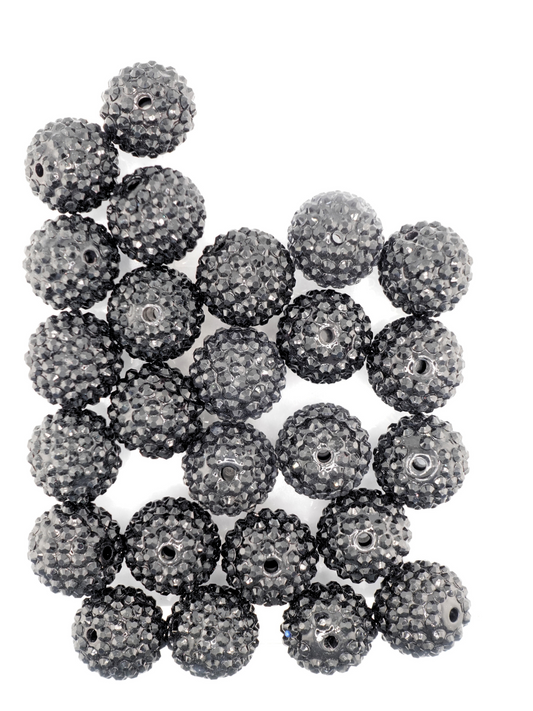 Collection of black beads with rhinestone texture