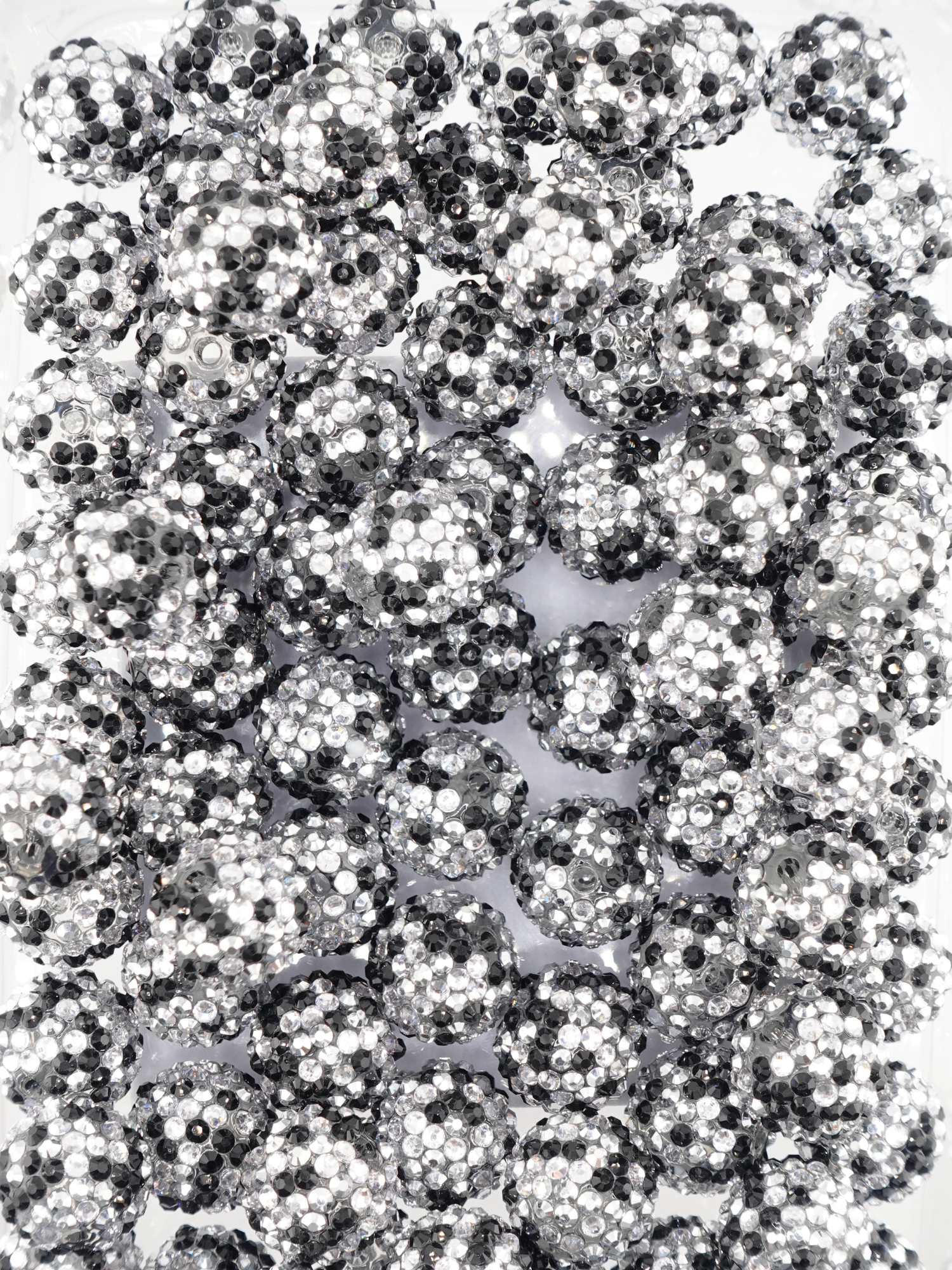 Collection of black and white beads with a mixed design