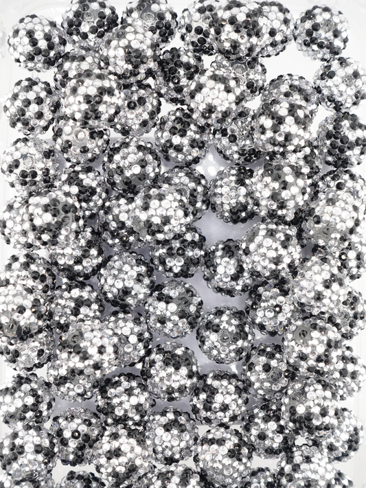 Collection of black and white beads with a mixed design