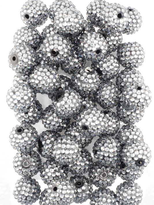 Collection of charcoal colored beads with rhinestone texture