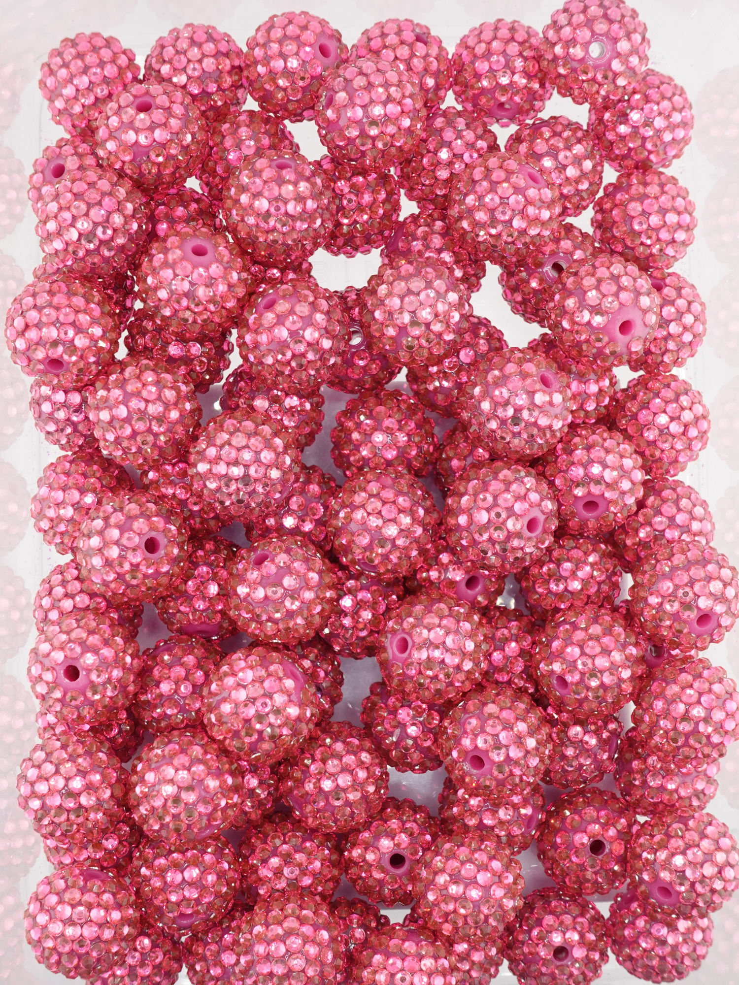 Collection of hot pink rhinestone textured beads