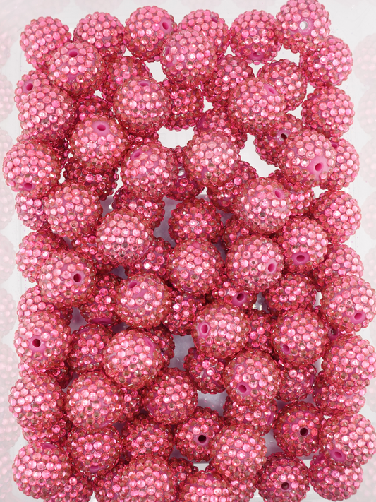 Collection of hot pink rhinestone textured beads