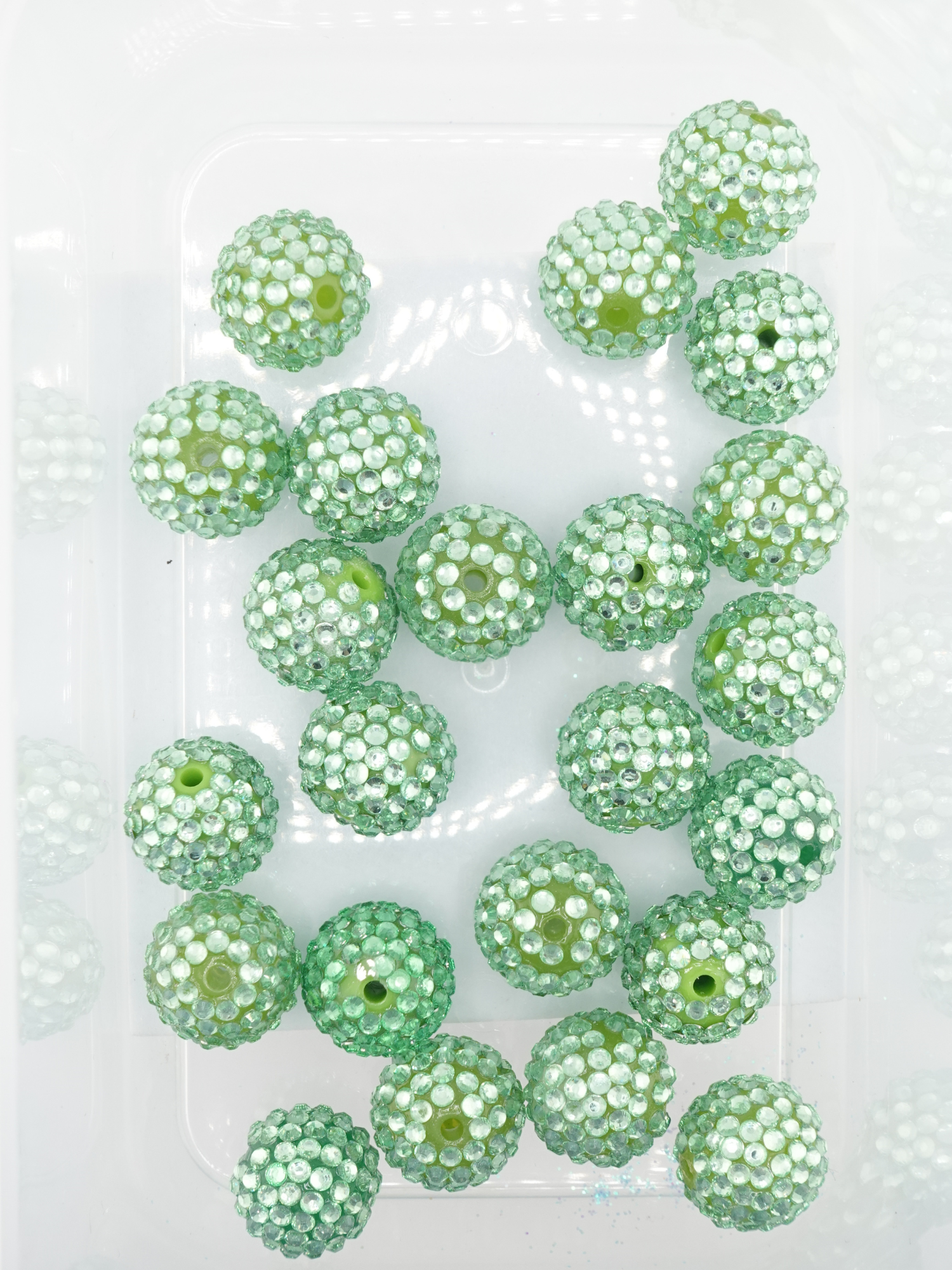 Collection of light green rhinestone textured beads
