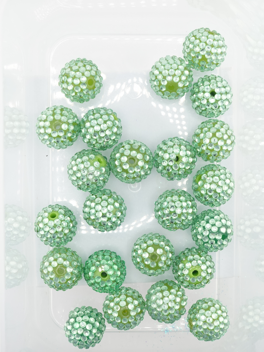 Collection of light green rhinestone textured beads