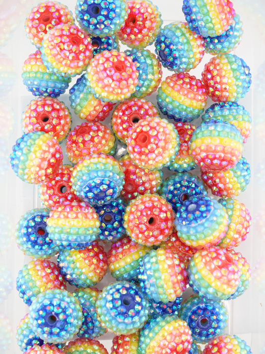 Collection of rainbow colored rhinestone beads