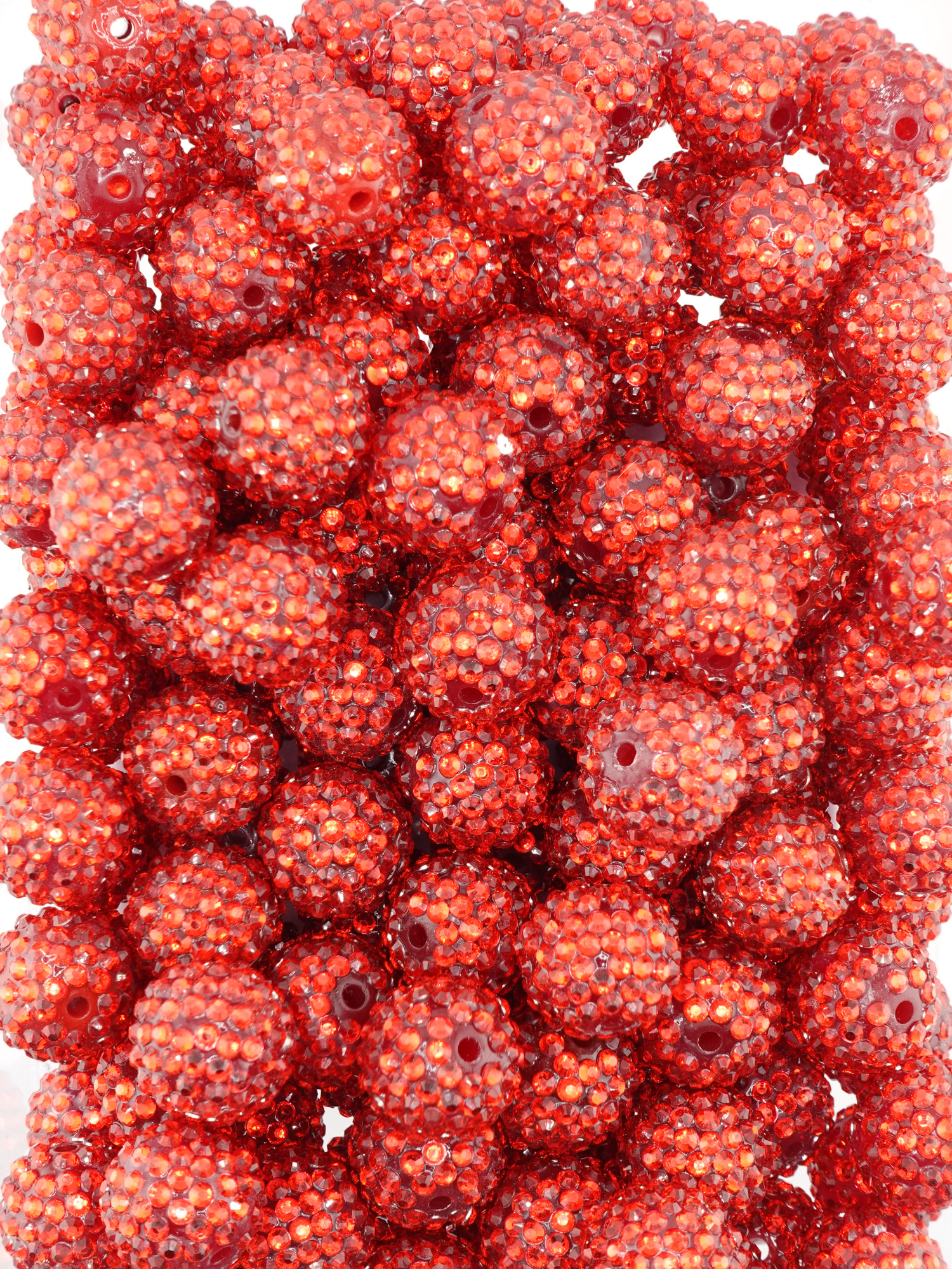 Collection of red rhinestone textured beads