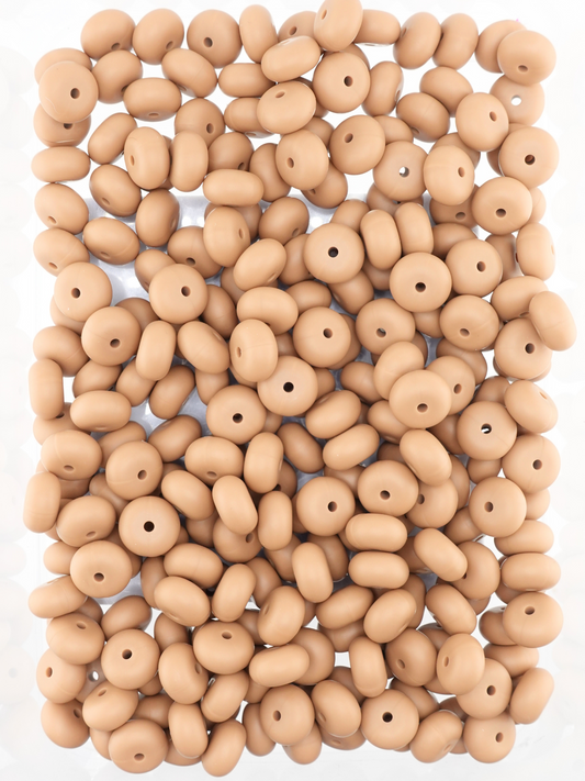 Collection of light brown colored silicone spacers