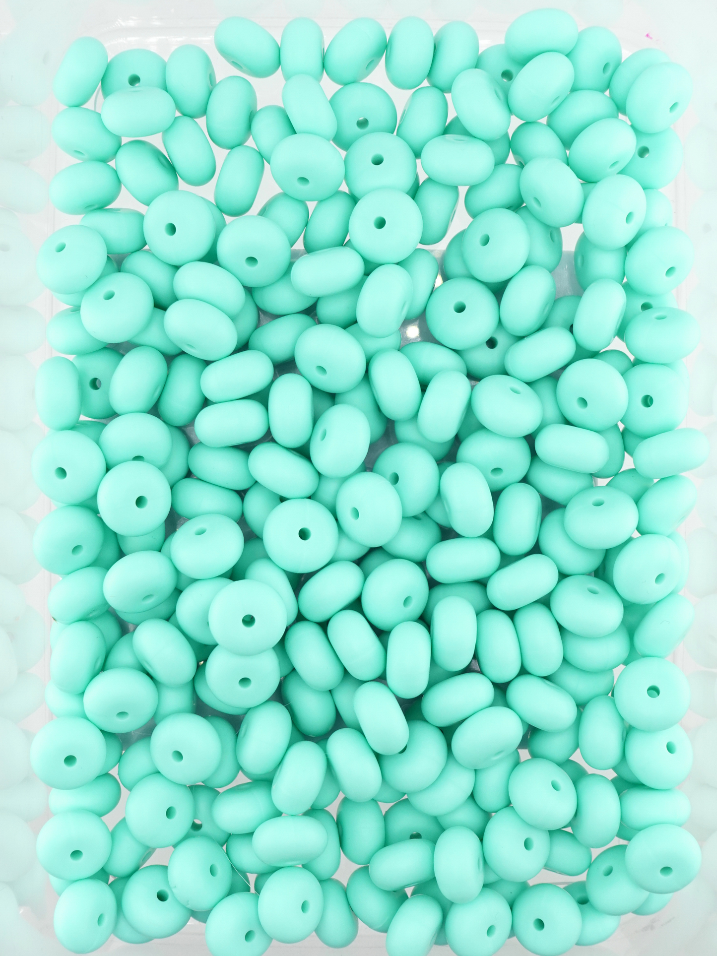 Collection of matte mint colored silicone spacers