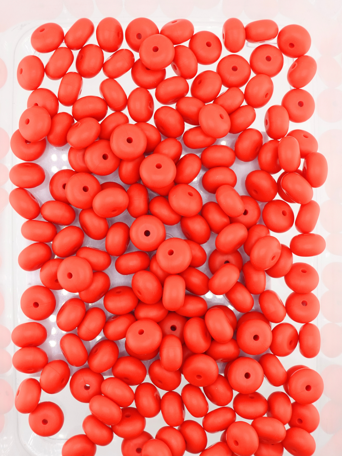 Collection of red matte colored silicone spacers