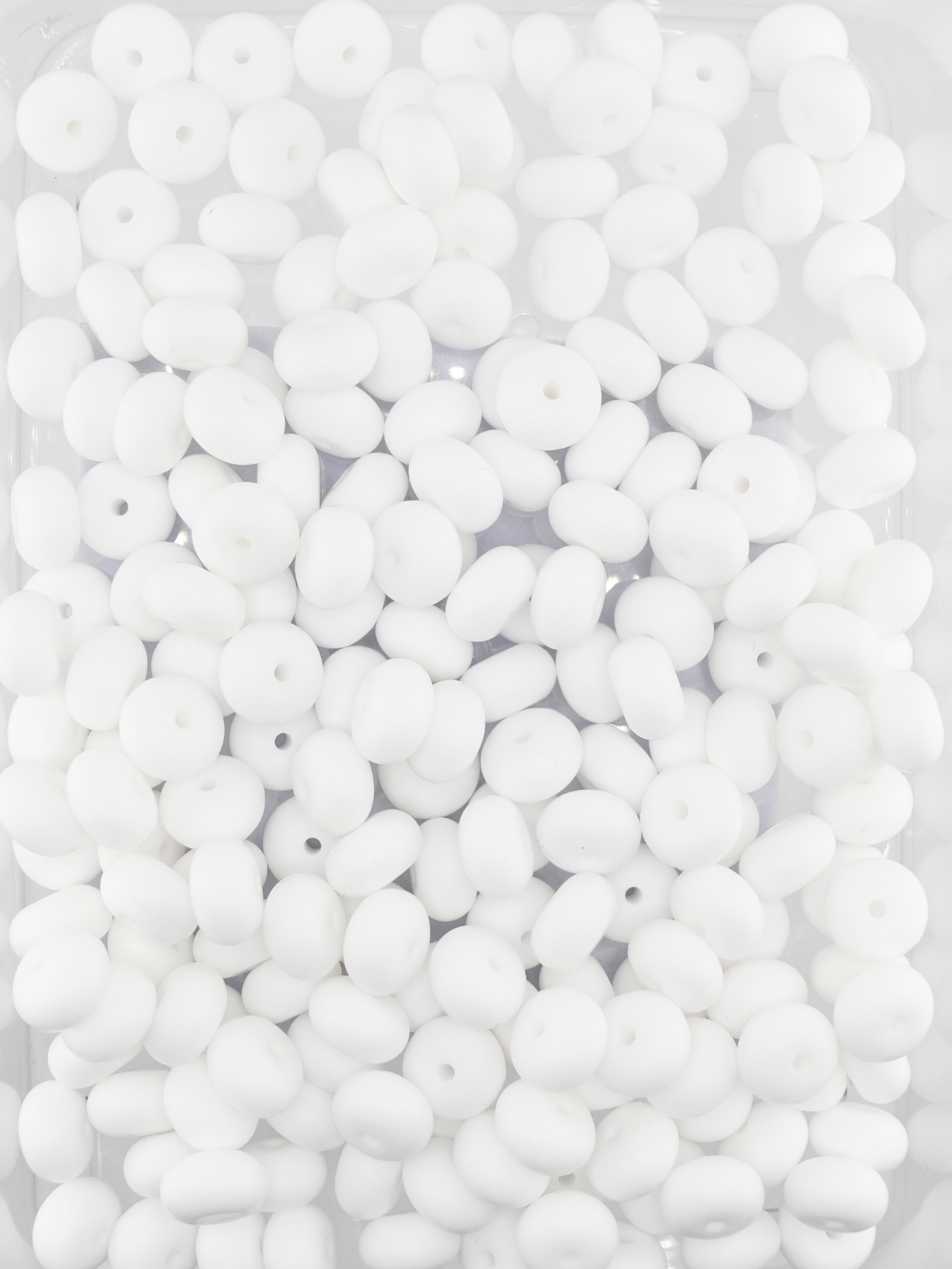 Collection of white matte colored silicone spacers