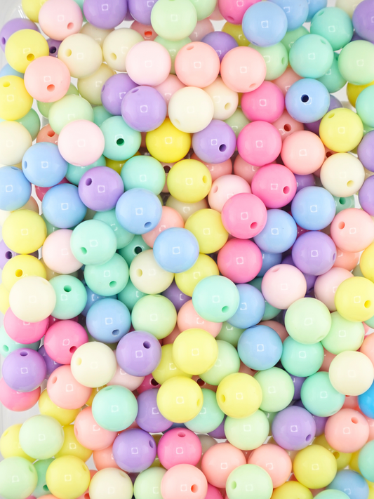 Collection of solid jelly beads in a variety of pastel colors