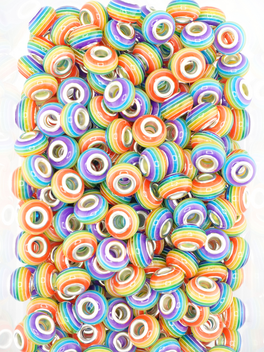 Collection of dark rainbow colored spacers
