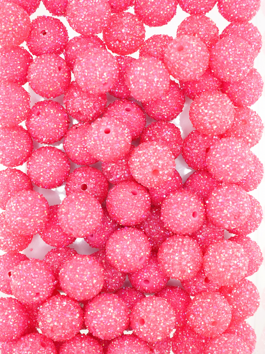 Collection of sugar beads in the color fuchsia