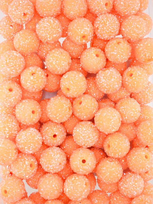 Collection of sugar beads in the color orange
