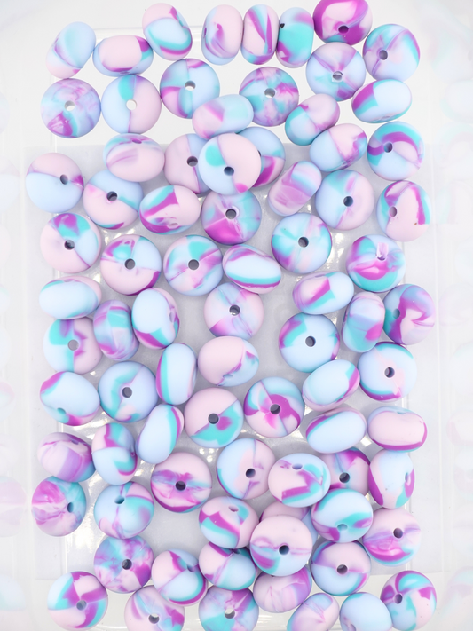 Collection of multicolored silicone spacers with a swirl pattern
