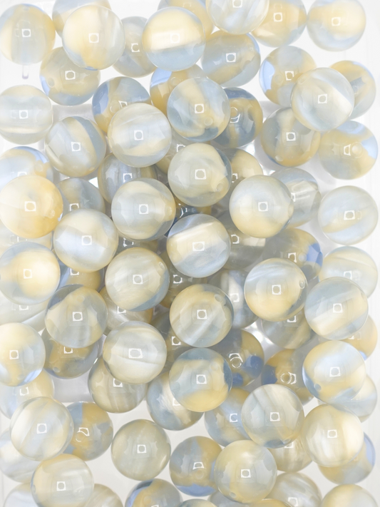Collection of volcano beads in the colors blue and champagne