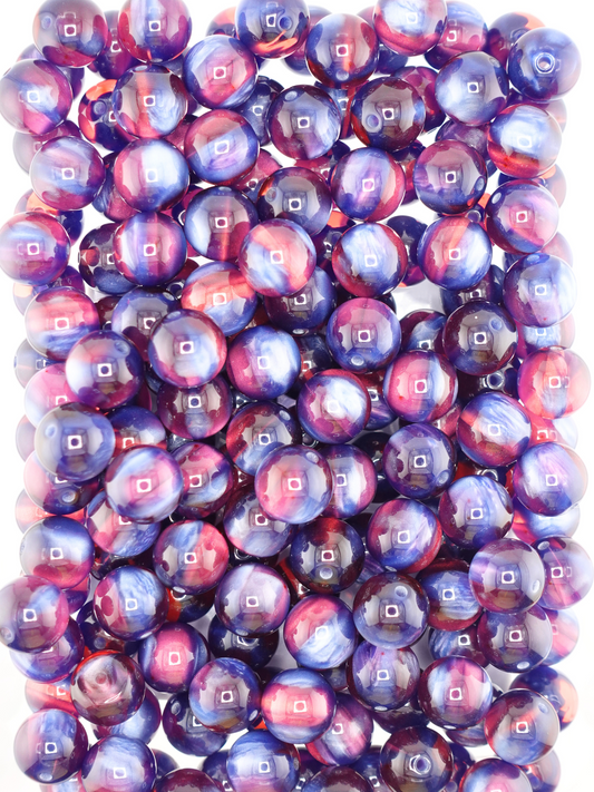 Collection of 16mm volcano beads in the colors blue and magenta