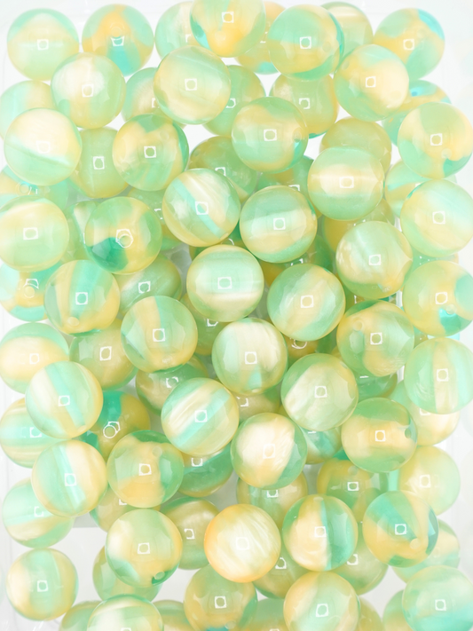 Collection of volcano beads in the colors lime and peach